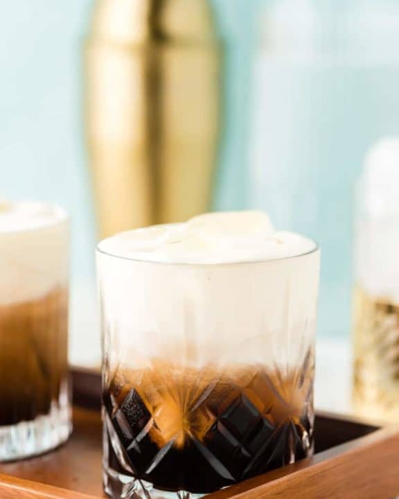 White Russian drink on a serving tray