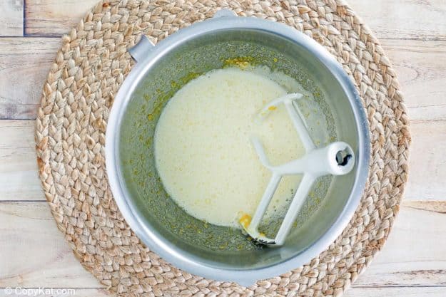 eggs and sugar whipped together in a mixing bowl