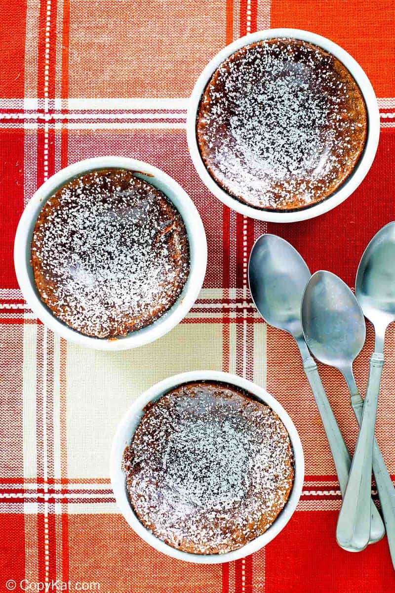 overhead view of three chocolate melting cake desserts