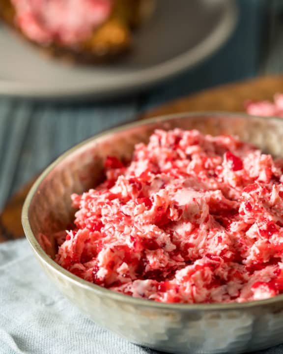cranberry butter in a small metal bowl