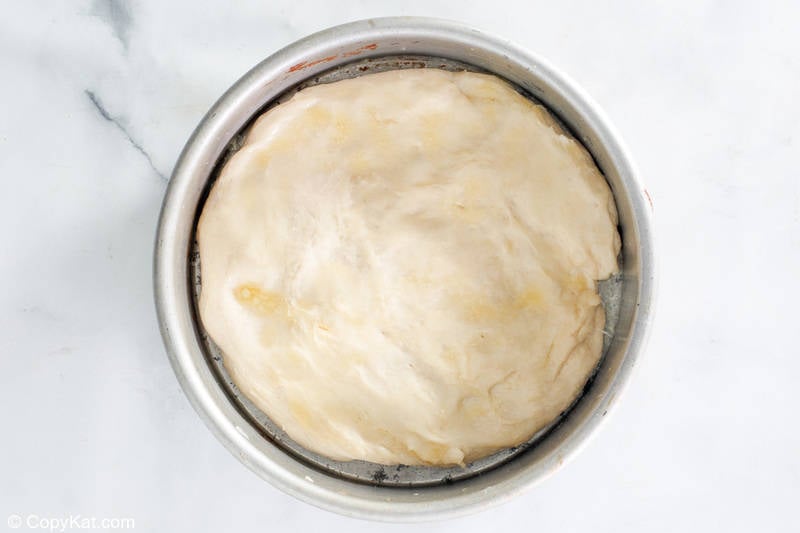 old fashioned coffee cake dough in a cake pan