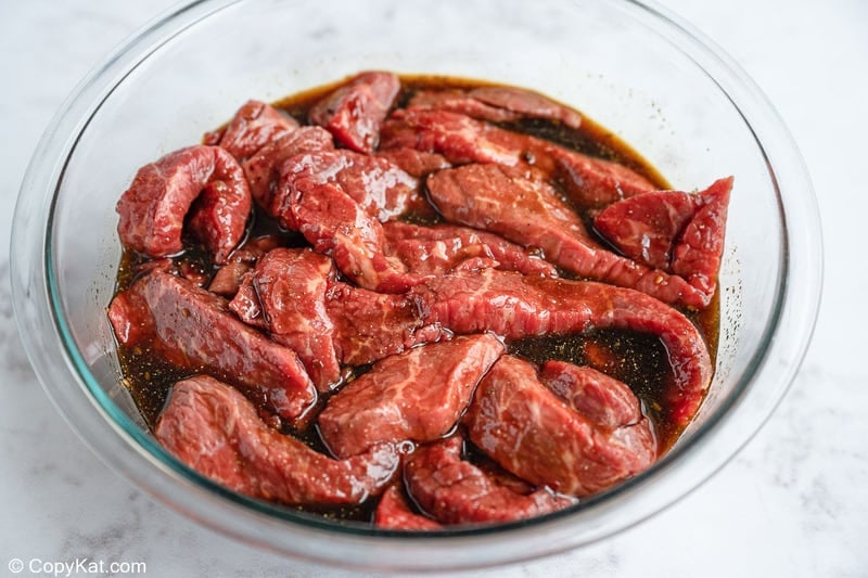 beef strips marinating for spicy beef jerky