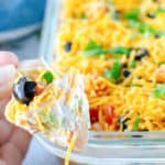 7 layer dip on a tortilla chip