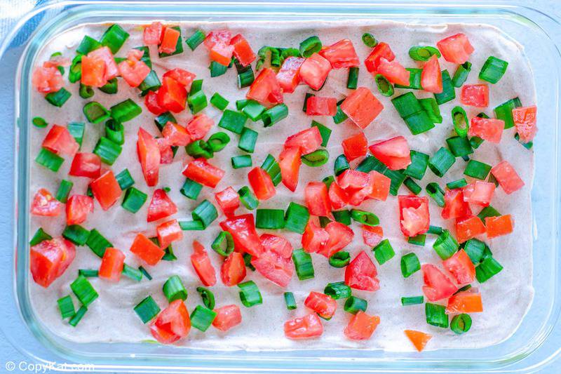 7 layer dip chopped tomatoes layer