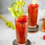 bloody mary cocktails on coasters