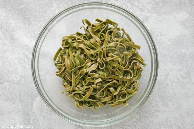 spinach fettuccine noodles in a bowl