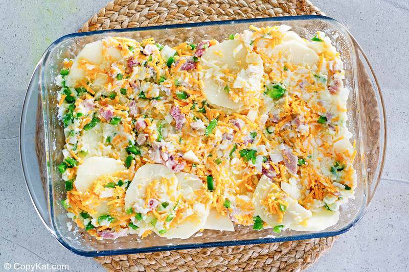 cheese scalloped potatoes and ham casserole before baking