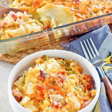 cheesy scalloped potatoes and ham casserole in a baking dish and bowl