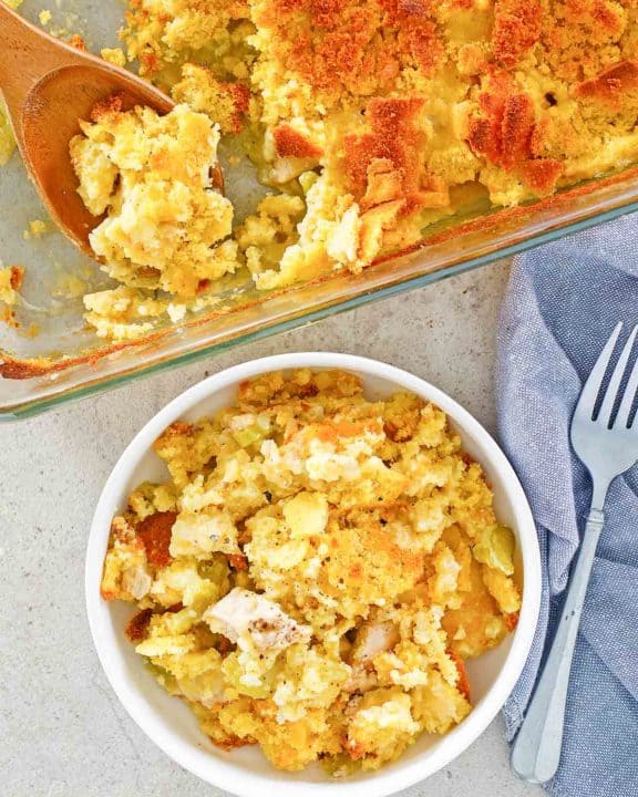 overhead view of homemade Cracker Barrel chicken casserole in a bowl and baking dish