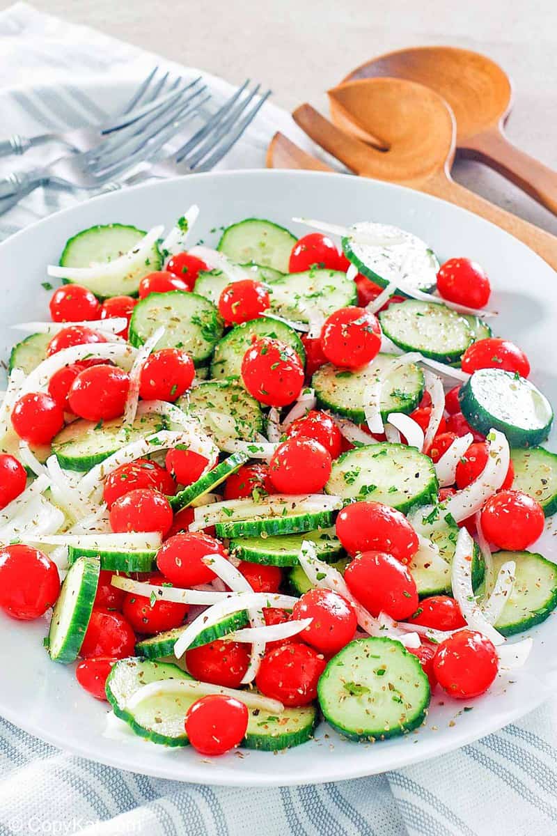 homemade Cracker Barrel Cucumber Tomato and Onion Salad on a platter
