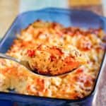 homemade Cracker Barrel loaded hash brown casserole on a spoon