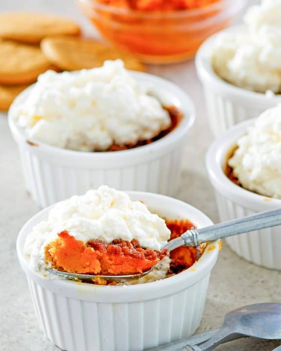 pumpkin custard with gingersnap crust and pumpkin pie spice whipped cream