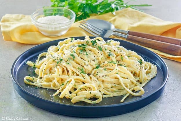 fettuccine noodles with creamy alfredo sauce and parmesan