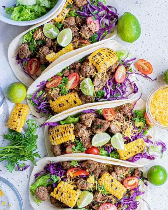 overhead view of four ground beef tacos