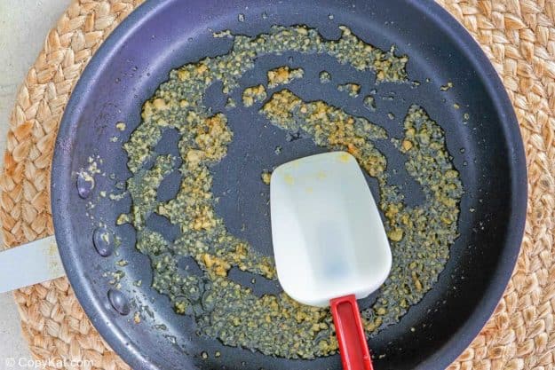 olive oil and mined garlic in a skillet