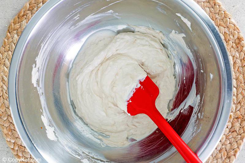 sour cream beet salad dressing in a mixing bowl