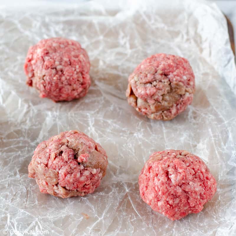 ground beef shaped into balls.