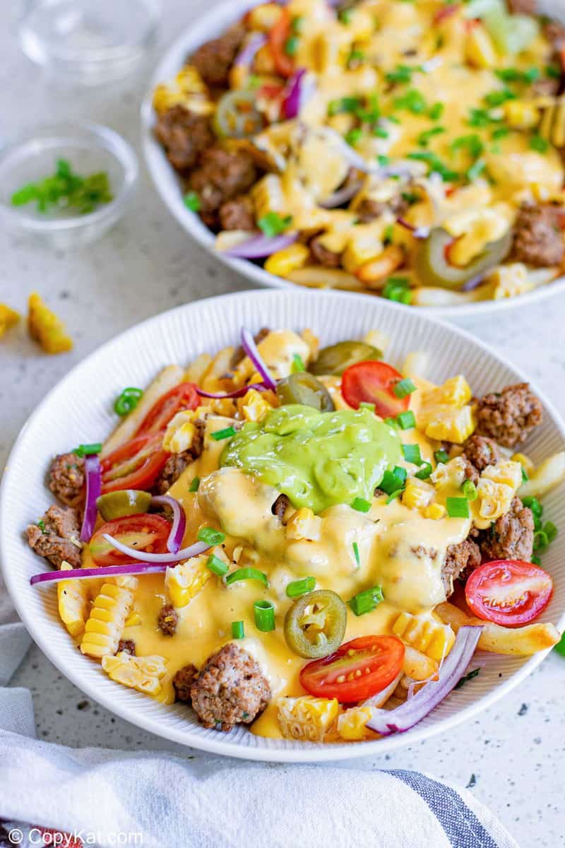 two bowls of homemade Taco Bell Nacho Fries BellGrande