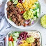 overhead view of two taco bowls with ground beef