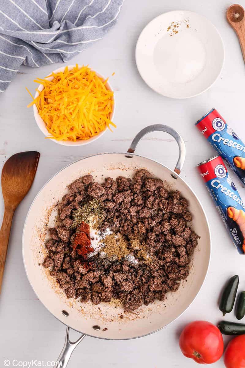 browned ground beef and seasonings in a skillet