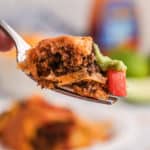 a piece of a taco ring on a fork