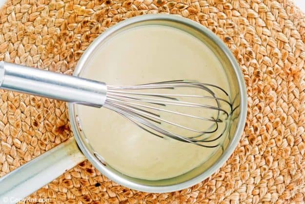 asiago alfredo sauce in a pan