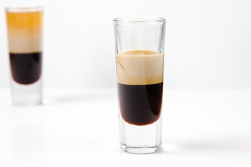 Bailey's Irish Cream on top of Kahlua in a shot glass