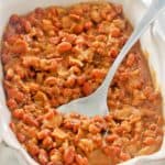 barbecue baked beans and a spoon in a serving dish
