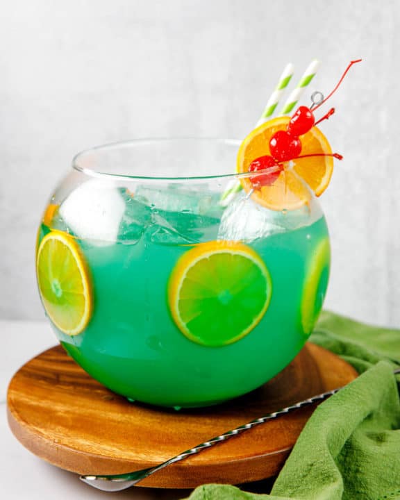 homemade Bennigan's Paddy 'O Punch cocktail on a round wood coaster