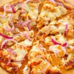 homemade CPK BBQ chicken pizza on a pizza peel