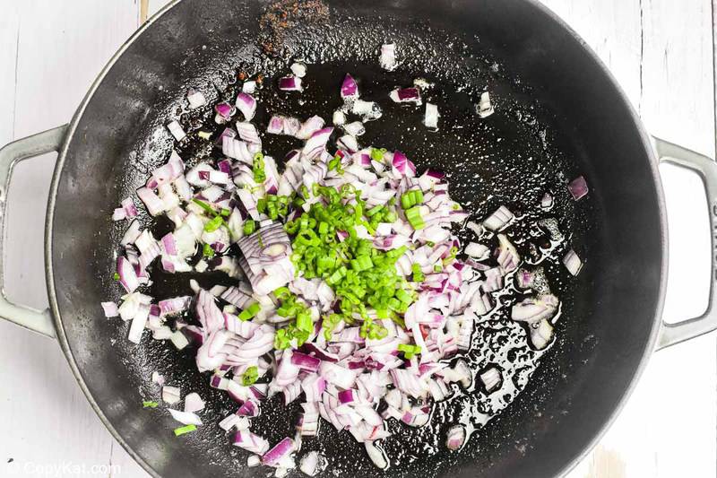 cooking onions for huevos rancheros