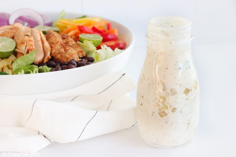 creamy salsa verde salad dressing and a chicken fajita salad