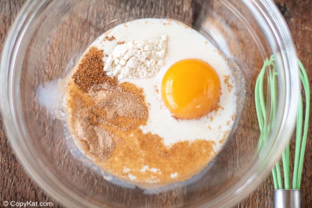 French Toast sticks batter ingredients in a bowl