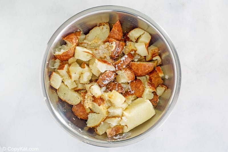 garlic mashed potatoes ingredients in a bowl before being mixed