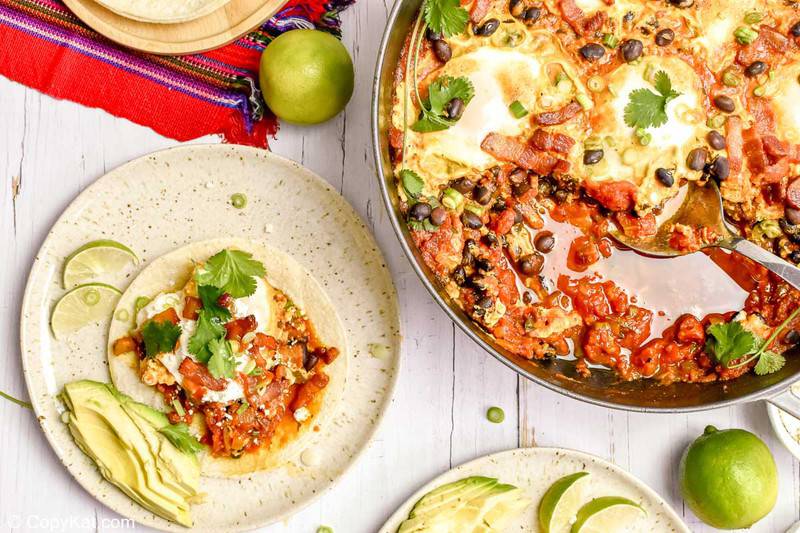 huevos rancheros on a plate and in a pan