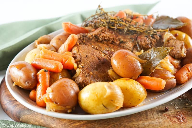 Instant Pot tri tip roast, carrots, and potatoes on a platter