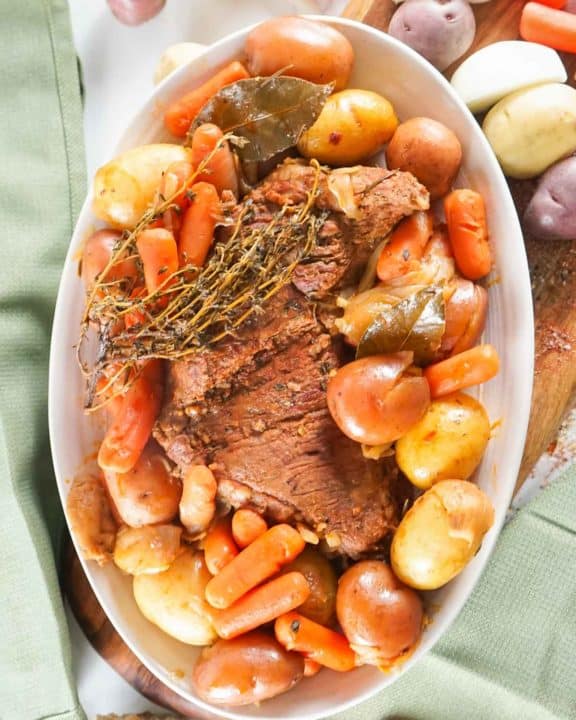 overhead view of Instant Pot tri tip roast and vegetables on a large platter