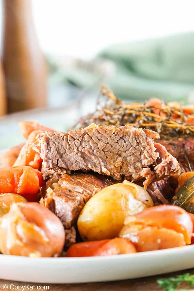 Instant Pot tri tip roast slice, potatoes, and carrots