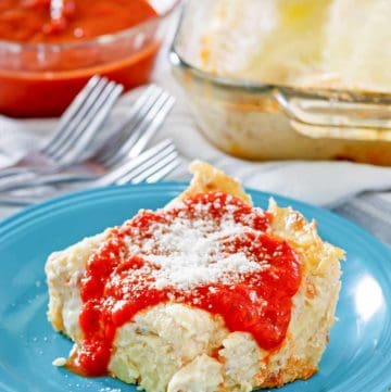 a serving of homemade Olive Garden 5 cheese lasagna on a plate