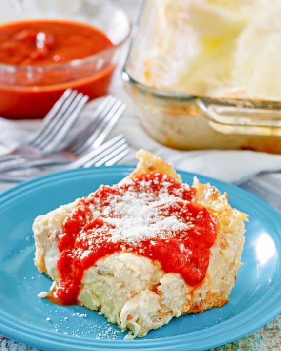 a serving of homemade Olive Garden 5 cheese lasagna on a plate