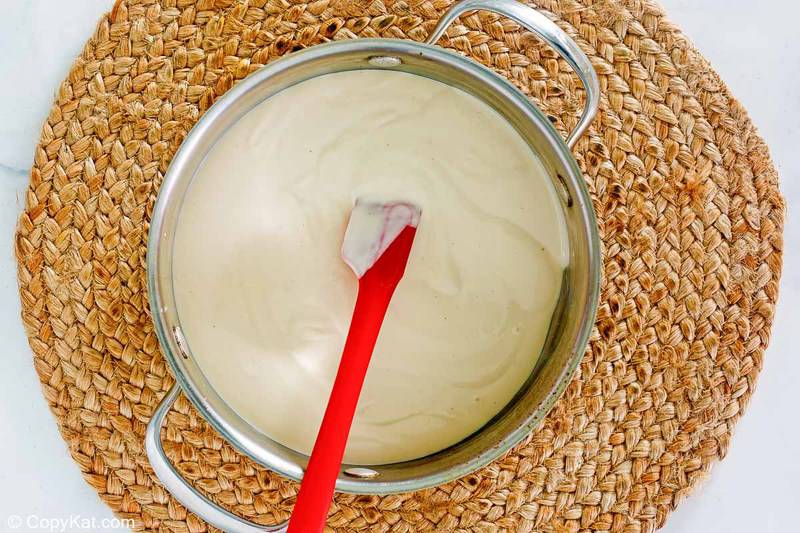 white sauce for cheese lasagna in a pan