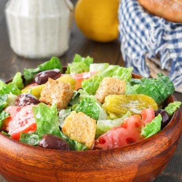 homemade Olive Garden salad in a wood bowl