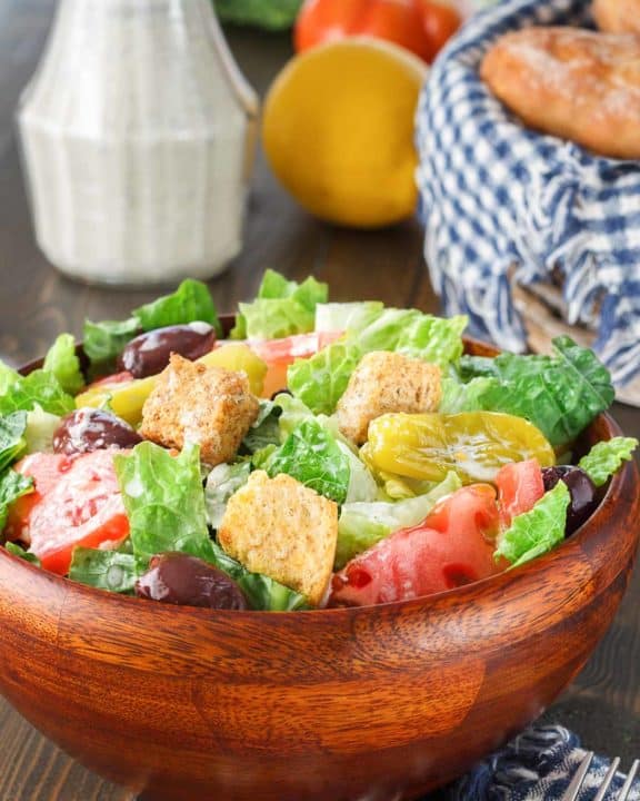 homemade Olive Garden salad in a wood bowl