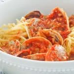 red clam sauce and pasta in a bowl