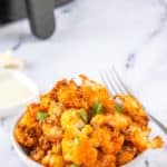 a bowl of air fryer buffalo cauliflower