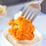 air fryer buffalo cauliflower bite on a fork