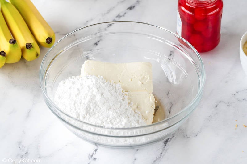 banana split cake cream cheese layer ingredients in a bowl