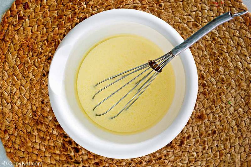 donut muffins wet ingredients mixture in a bowl
