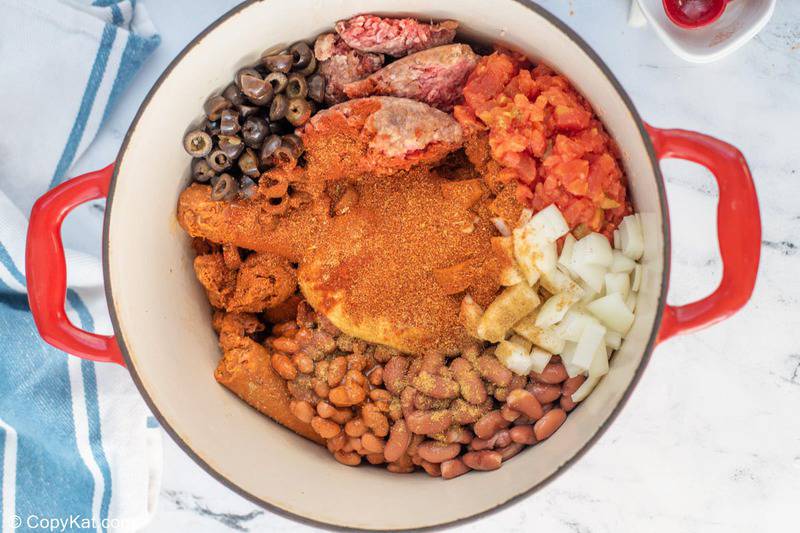 Dorito casserole meat and bean filling ingredients in a pot
