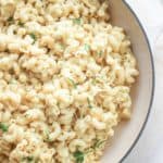 overhead view of white cheddar mac and cheese in a serving dish